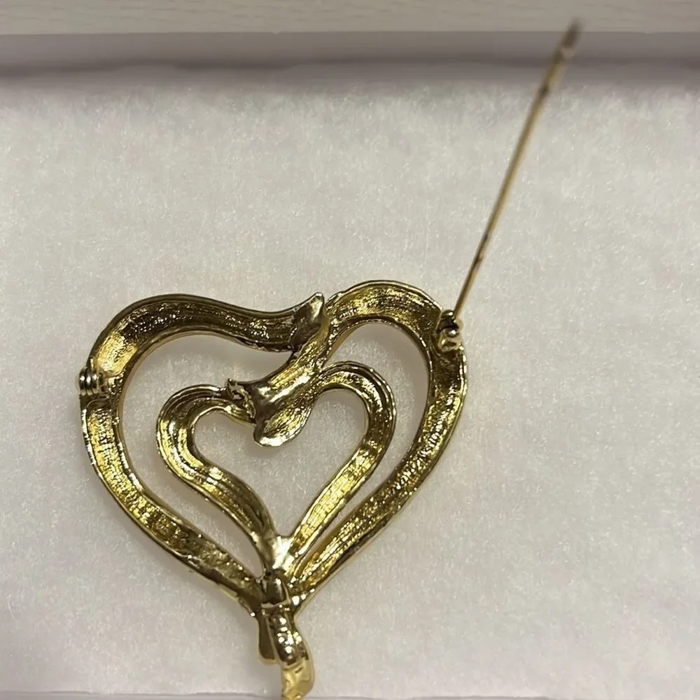 Elegant Golden AJC Brooch with Dual Hearts